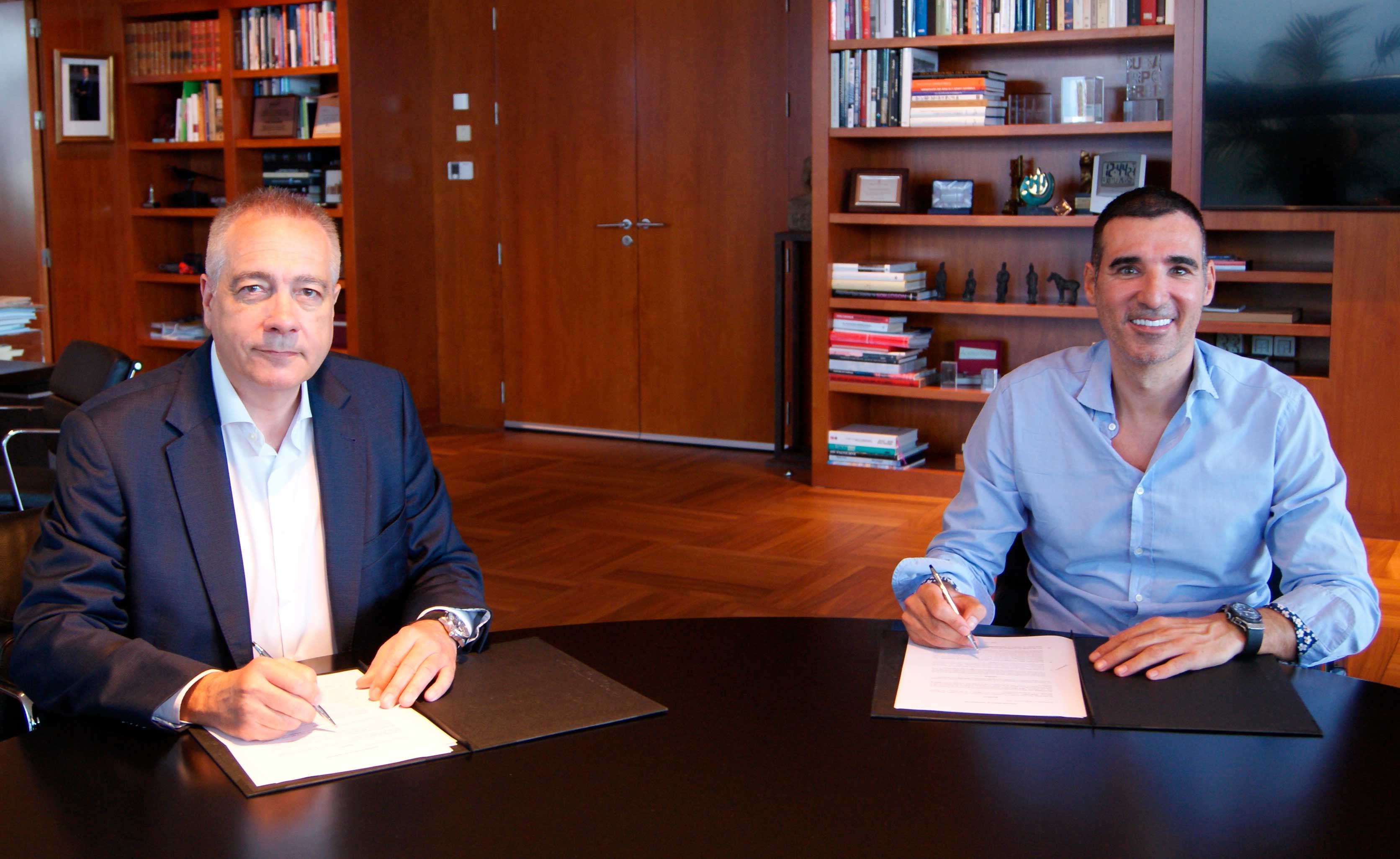 firma del concenio entre pere navarro y miquel vicente